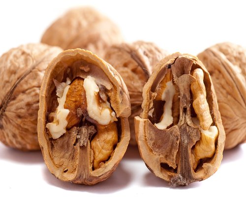 Close up of walnuts and seeds which are natural sources of Omega-3